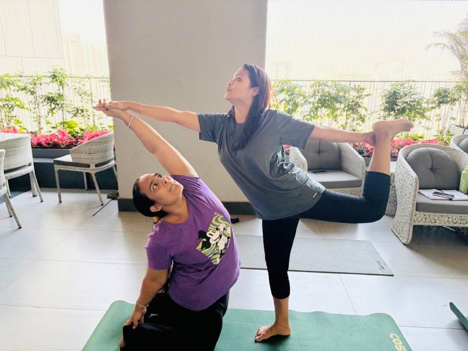 Partner dancer pose on a sunny balcony